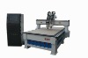 Cnc engraving machine with two heads
