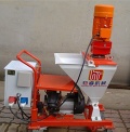 Mortar/cement spraying machine