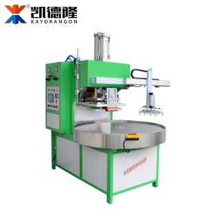 Automatic 4 position round plate blister packing machine with robot hand