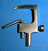 We manufacture  looper,needle plate,presser foot,feed dog and other sewing machine parts
