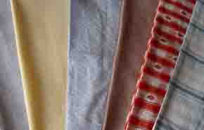 short  boxers,shirts, yarn-dyed  fabrics,pants, neckties,  silk scarves