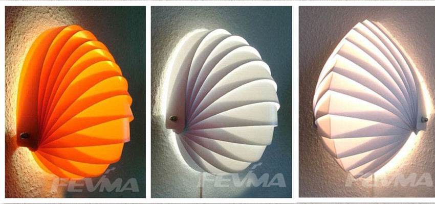 The creative and fashion wall lamp can be reversed to beautiful shell shape.