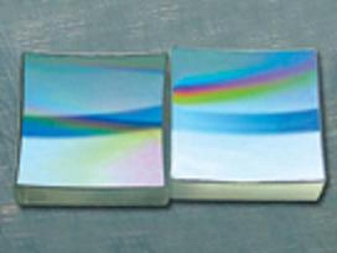 Reflective plane ruled Blazed Holographic Gratings