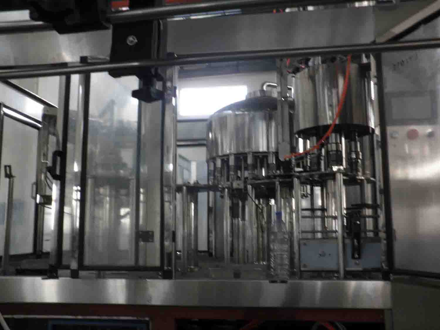 This machine is 3in1 washing filling and capping machine for water ,juice and non-carbonated beverage.
