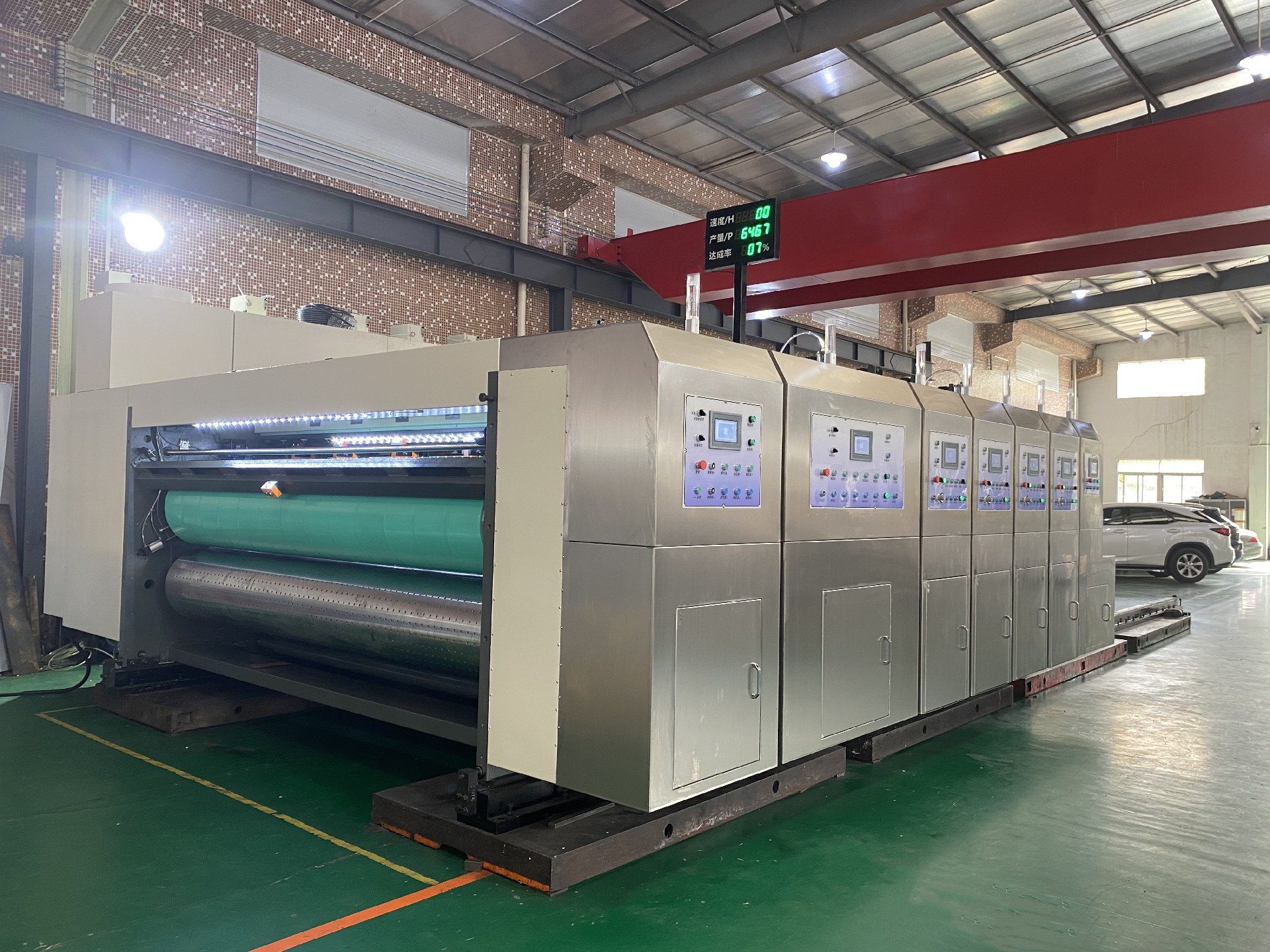 Automatic high speed printing die-cutting and slotting machine
