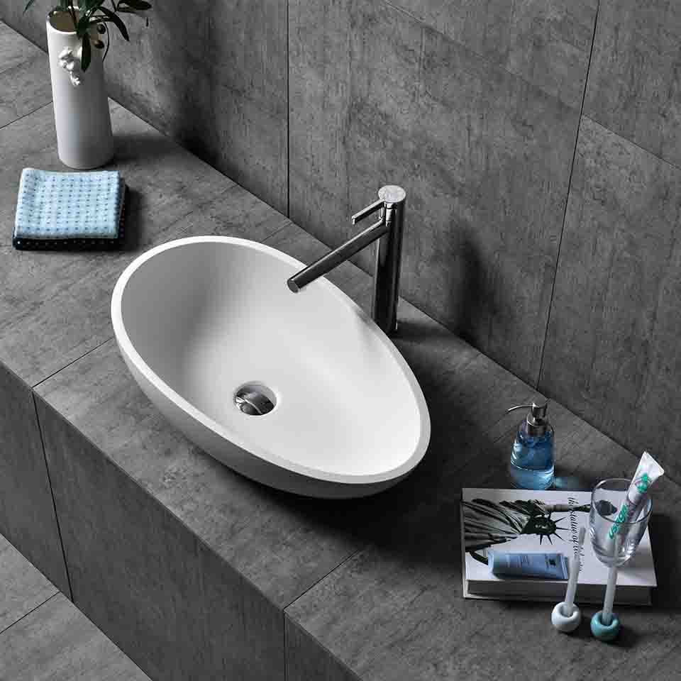 Solid surface wash sink
