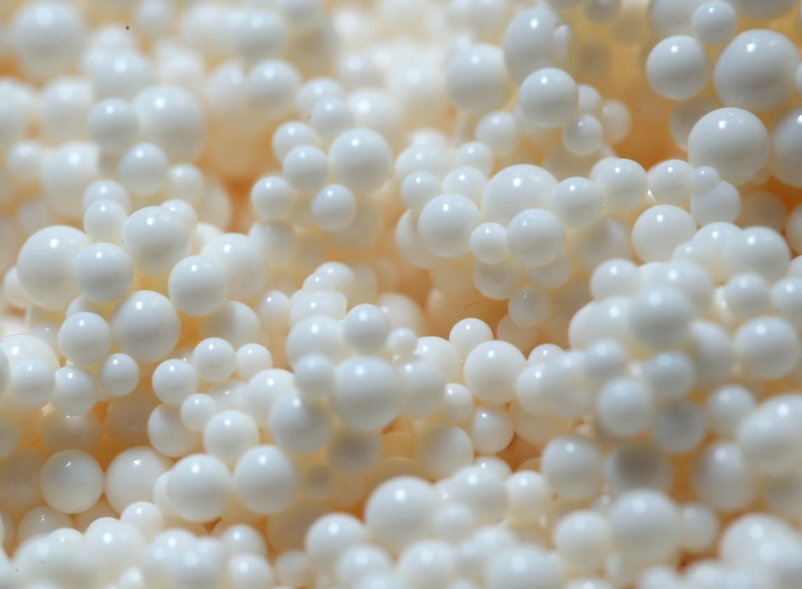 Gel type perchlorate selective strong base anion resin.