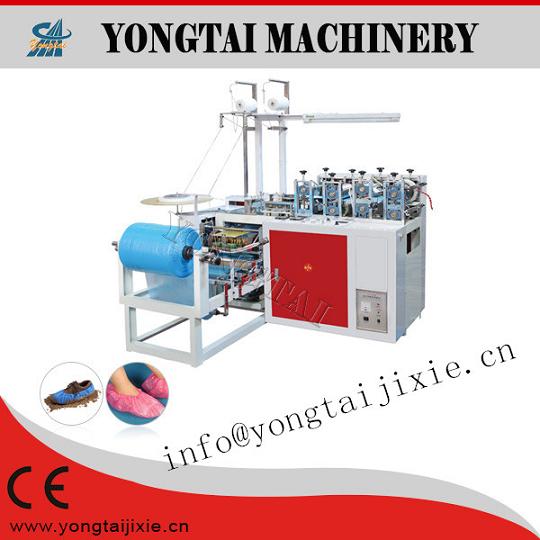 this is an automatic machine to produce plastic shoe cover.