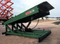 Stationary hydraulic yard ramp/leveler
