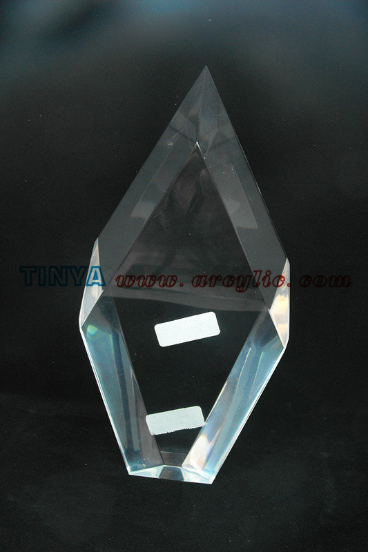 It is a transparent trophy with diamond-shaped.