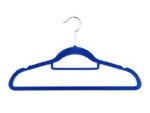 Suit hanger with tie bar and indent