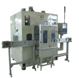 Piston deburring machine