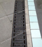 Ductile iron linear drainage channel cover grating