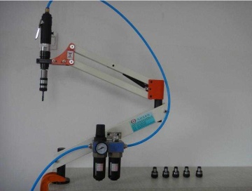 Universal pneumatic tapping machine