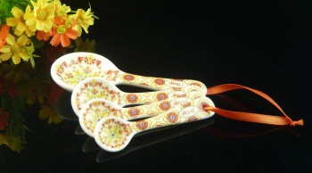 Ceramic orange set 4 measuring spoons