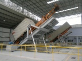 Container discharger
