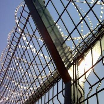 airport fence with razor barbed wire