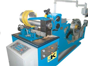 Fixed mold spiral duct machine