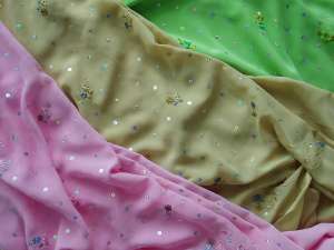 EMBELLISHING ADN PROCESSING  FABRIC