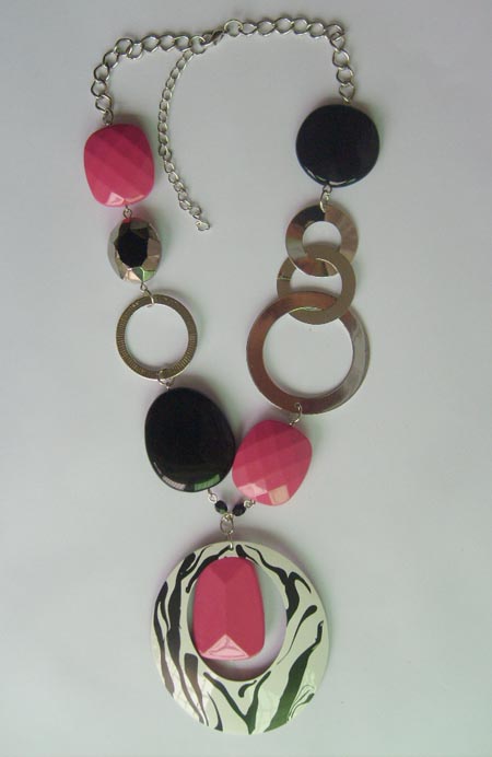 Necklace is made of black and pink acrylic beads,glass beads