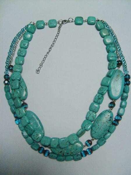 Necklace is made of stone,glass beads and seed beads.