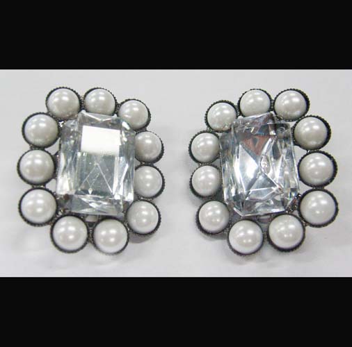 Earrings are made of alloy with acrylic.